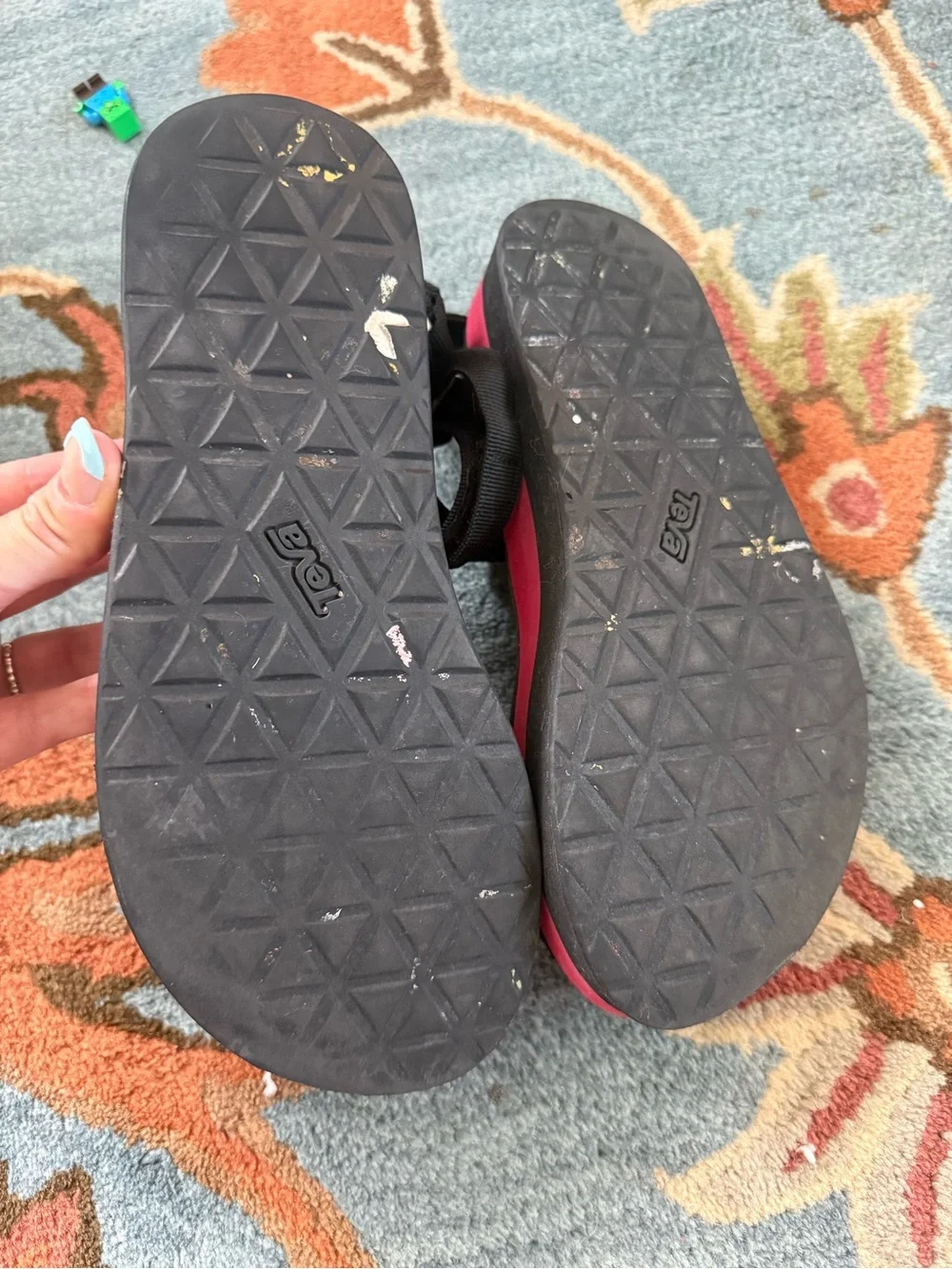 Teva’s Black Strappy Platform Sandals with Red Accent